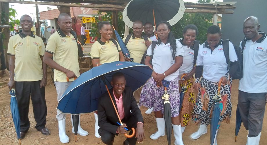 KEN-F VHTs in Malaba Town Council Tororo District pose for a photo during Community outreach